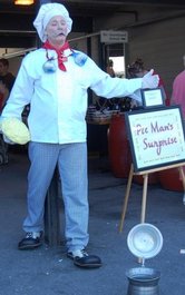 This is one example of a living statue - pie man,