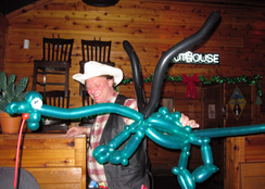 Mark Clark from Aardvark Entertainment with hiss dragon balloon sculpture. 
